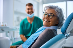 woman getting denture exam